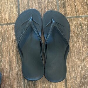 Archies Black Textured Flip Flops with Logo Detail